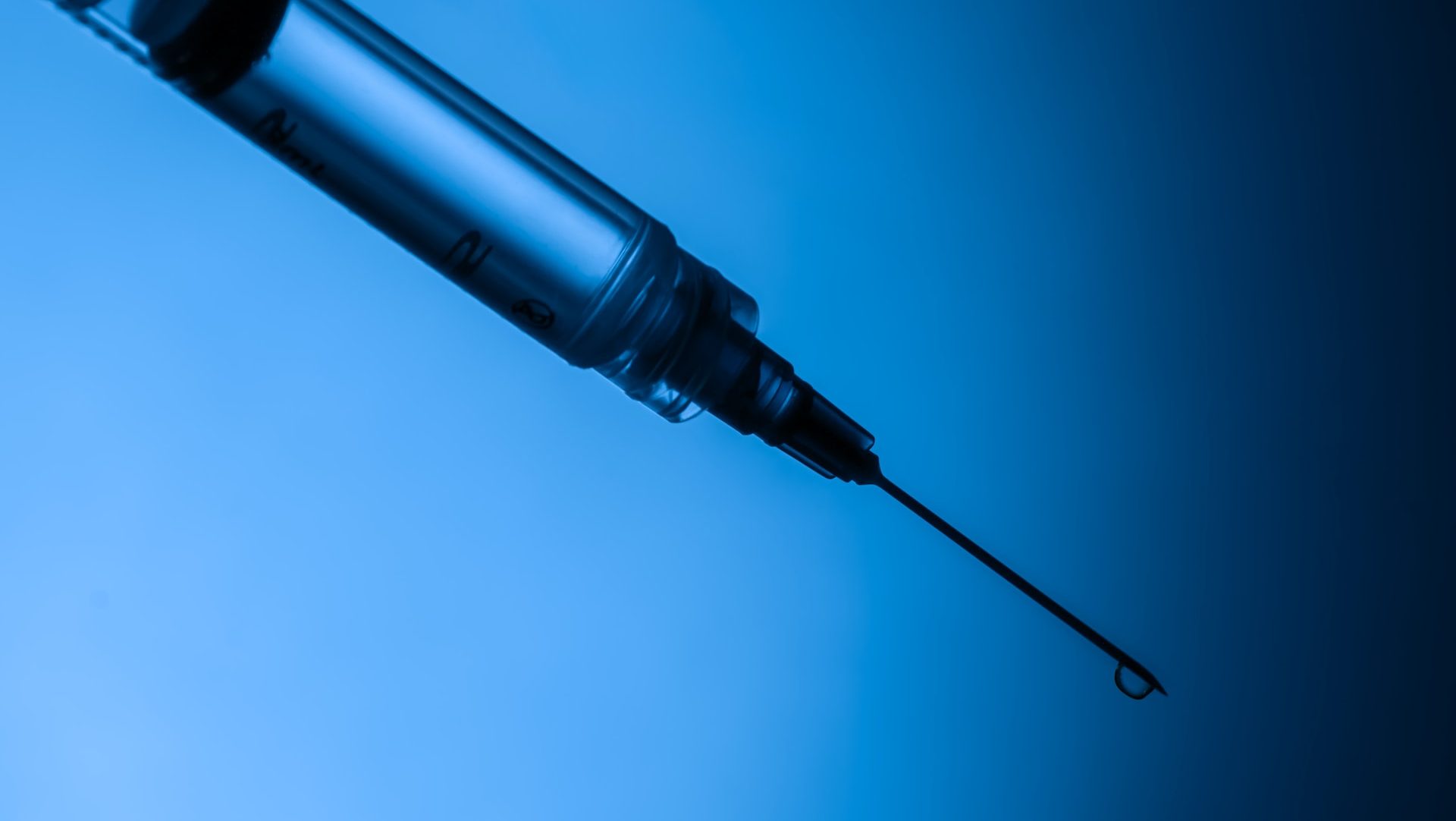a close-up of a syringe
